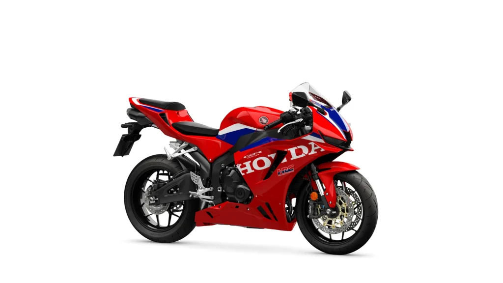 Honda CBR600RR 2027 v červenej Trikolóre z predného tričtvrťového pohľadu